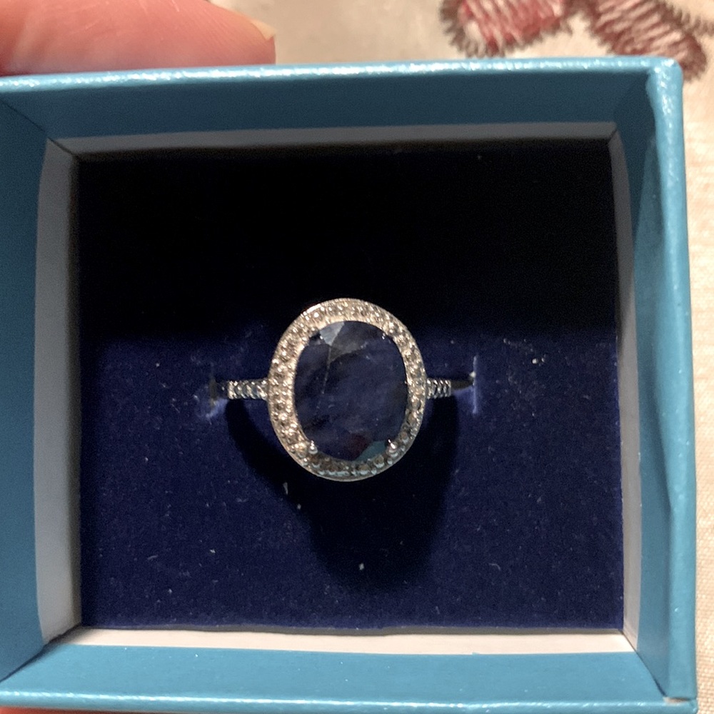Lab created sapphire ring set in sterling silver 925 band.size 7
